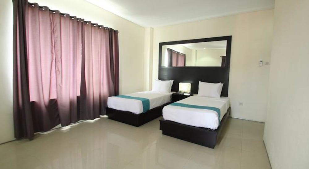 Super OYO 93765 Airport Kuta Bali Hotel 13/37