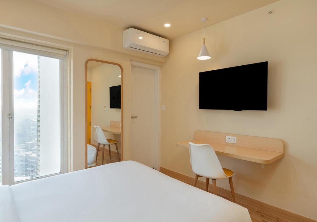 غرفة قياسية بسرير كوين، Bloom Hotel - Saki Vihar Powai 2/3