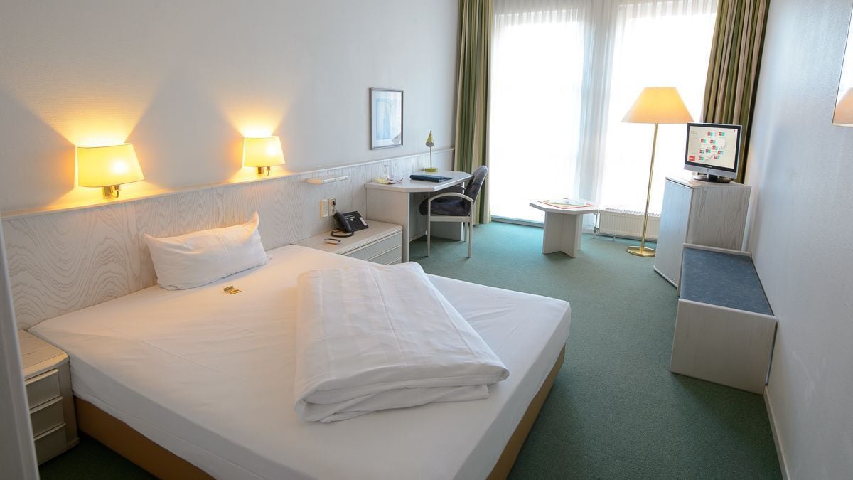 Family, 1 Double and 3 Single Beds