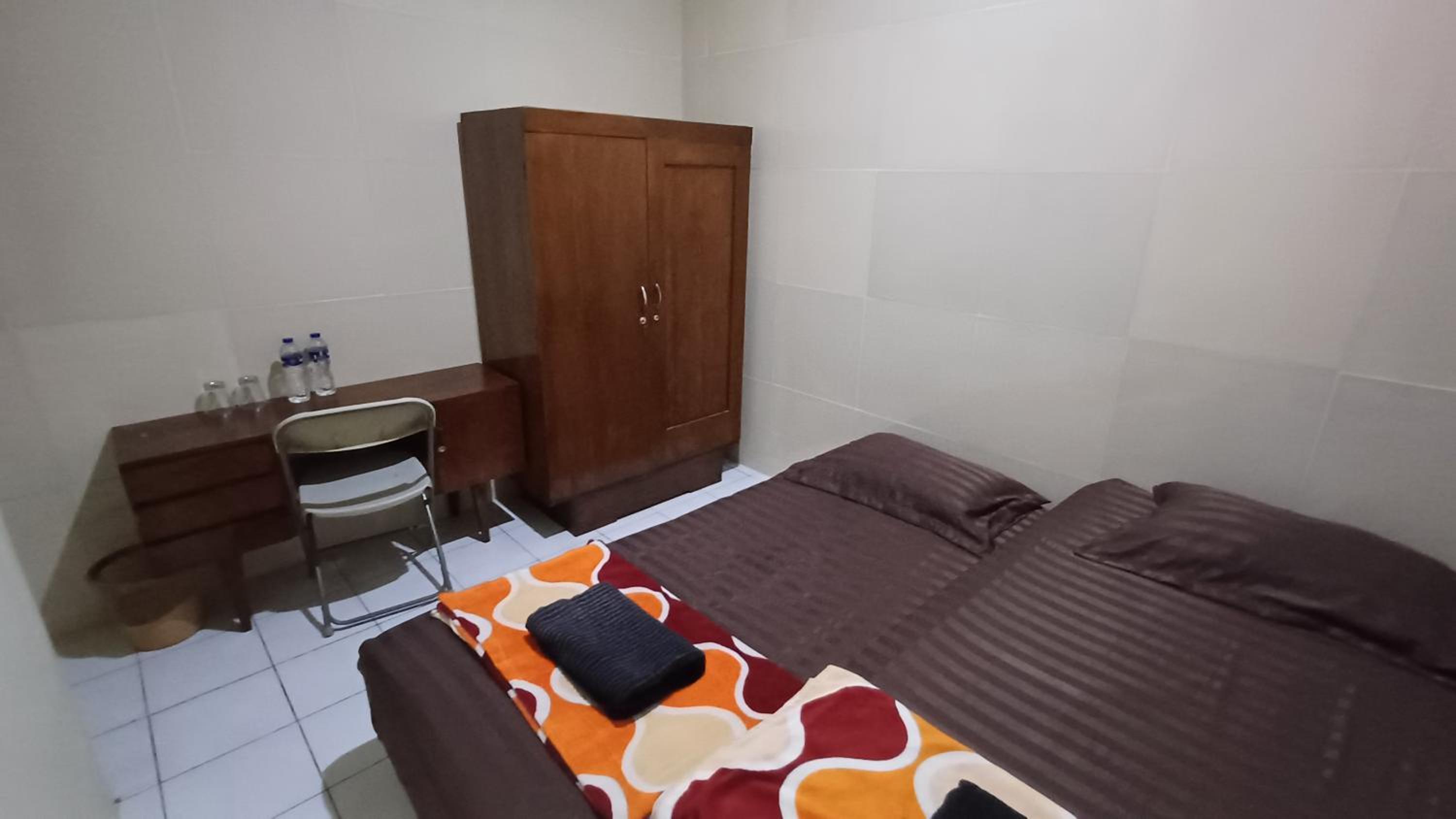 SPOT ON 3988 Kost Carmelia Baranangsiang Syariah 16/45