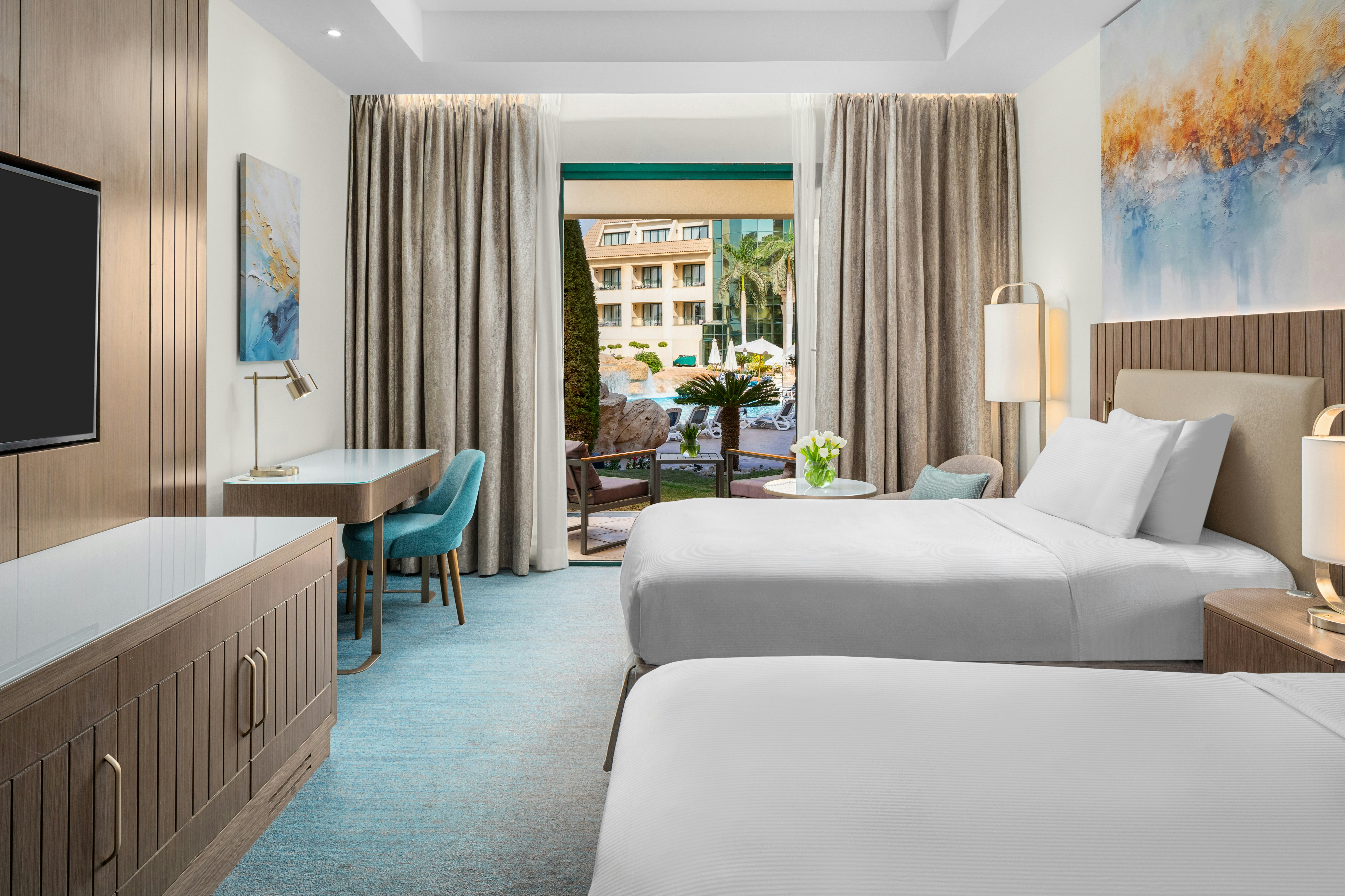 Room, Twin Beds, Pool Floor، Hilton Pyramids Golf Resort 2/7
