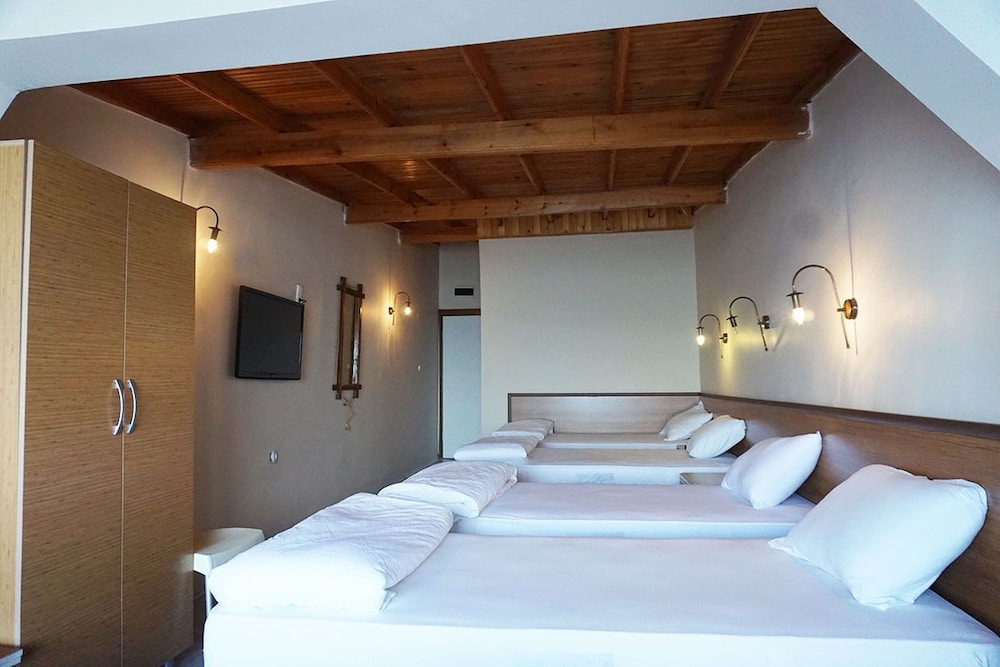 Family, 1 Double and 3 Single Beds