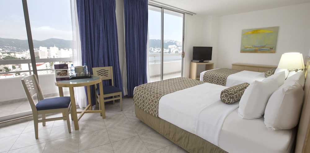جناح جونيور بسريرين مزدوجين بشرفة بإطلالة جزئية على البحر، HS Hotsson Smart Acapulco 6/10