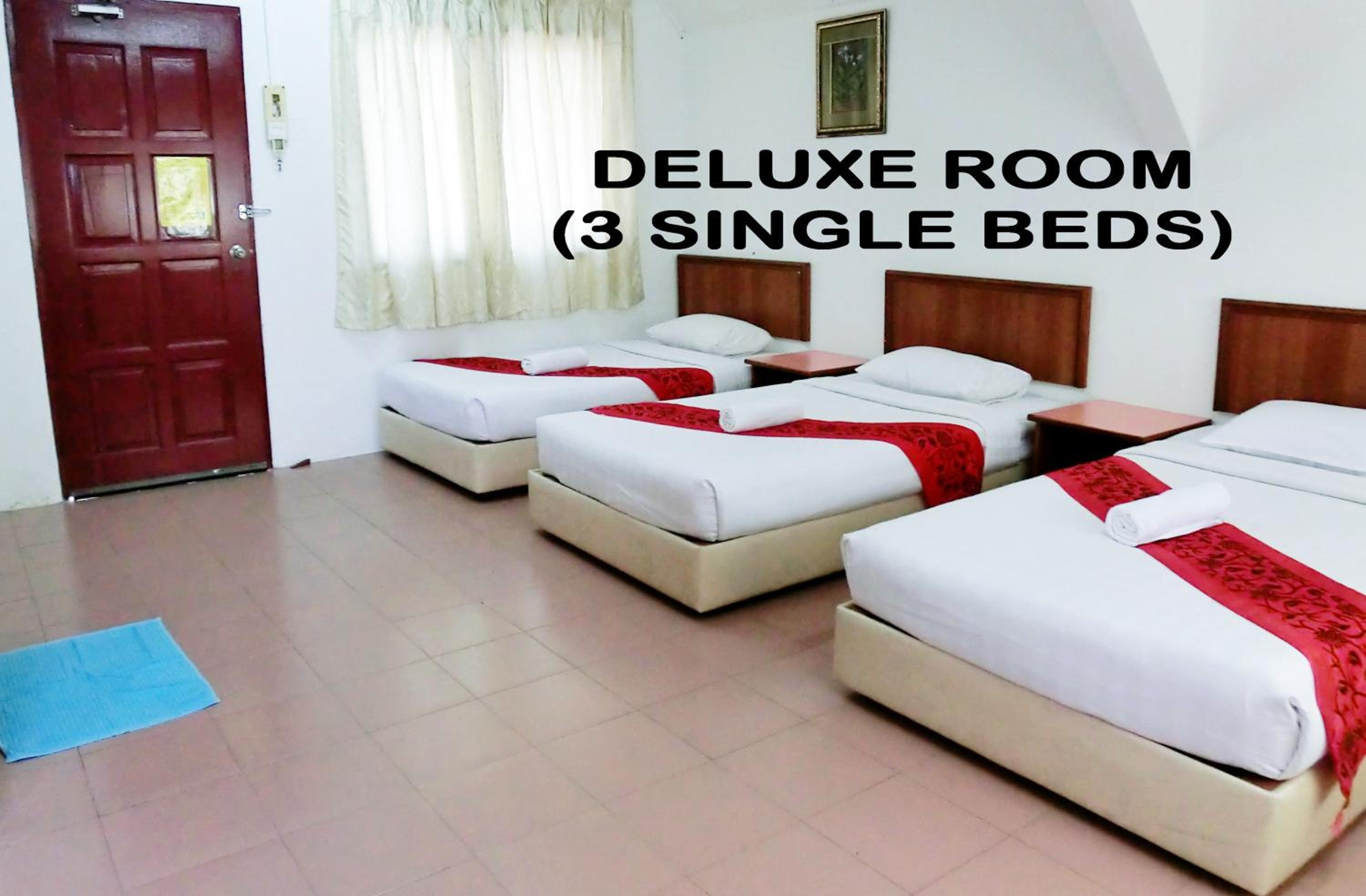 غرفة ديلوكس ثلاثية
