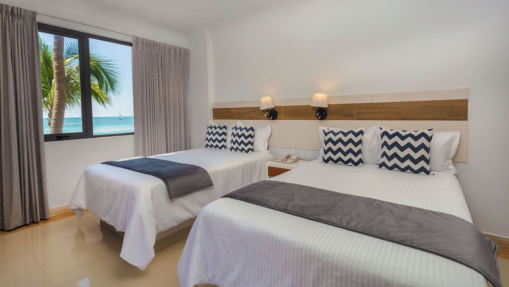 جناح جونيور بإطلالة على الحديقة بمطبخ صغير، Luna Palace Hotel and Suites 2/6