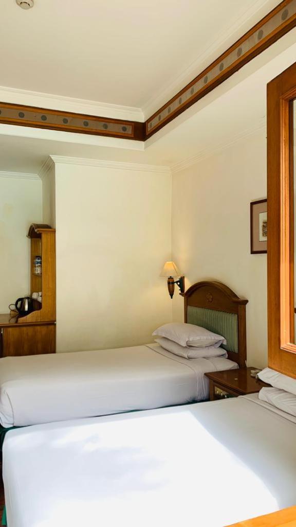 غرفة ديلوكس بسرير مزدوج أو سريرين منفصلين، KRESNA HOTEL WONOSOBO 7/8