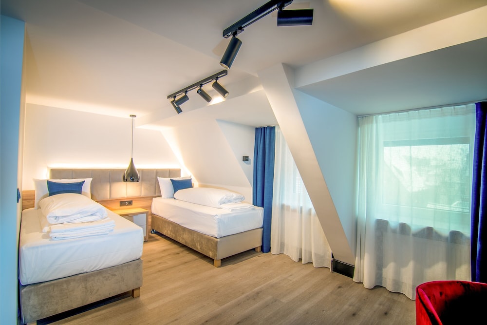 Hotel Wilder Mann 14/50