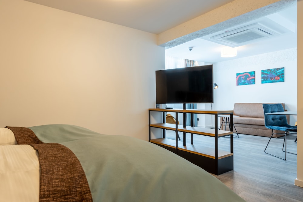 Trip Inn Living and Suites 26/42
