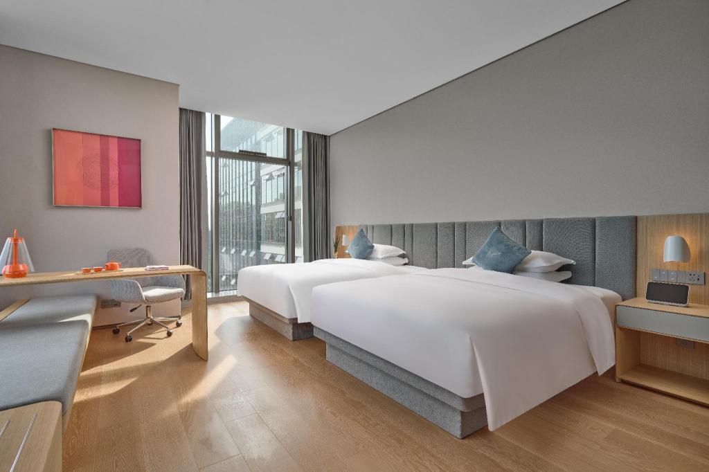غرفة بريميير عائلية بسريرين كوين