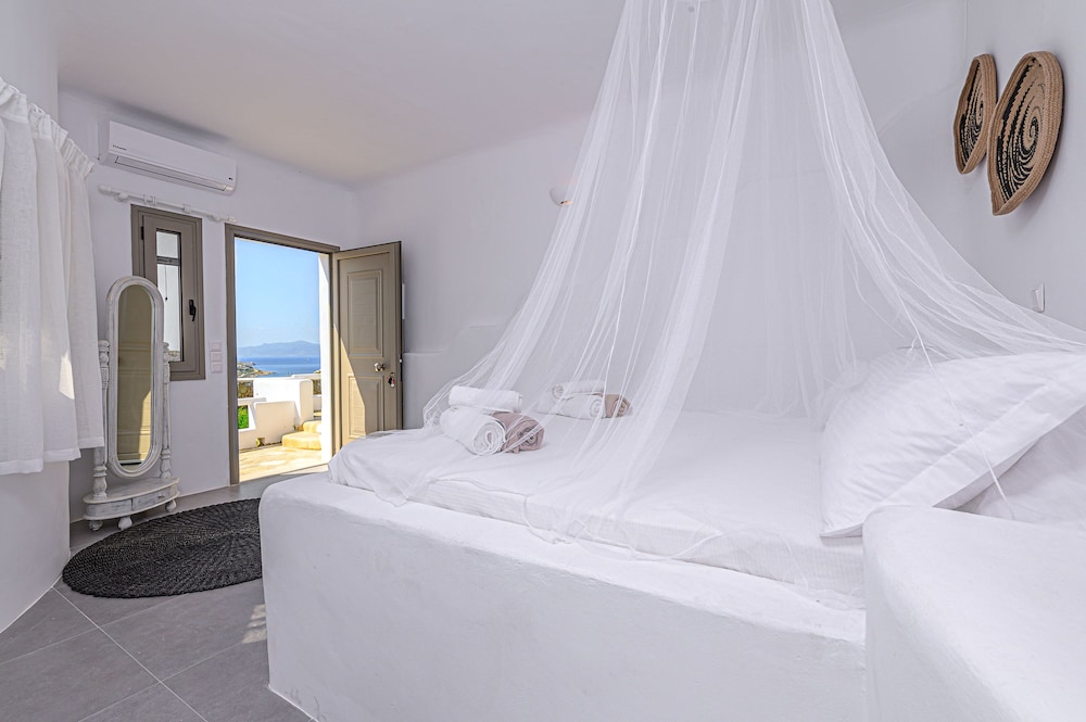 فيلا بريميوم بسريرين منفصلين وسريرين كوين بـ6 غرف نوم مع أريكة بمسبح خاص، 9 Muses Villas Mykonos 3/10