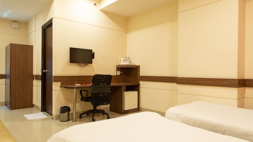 غرفة بسرير كوين، Ginger Hotel Tirupur 3/7