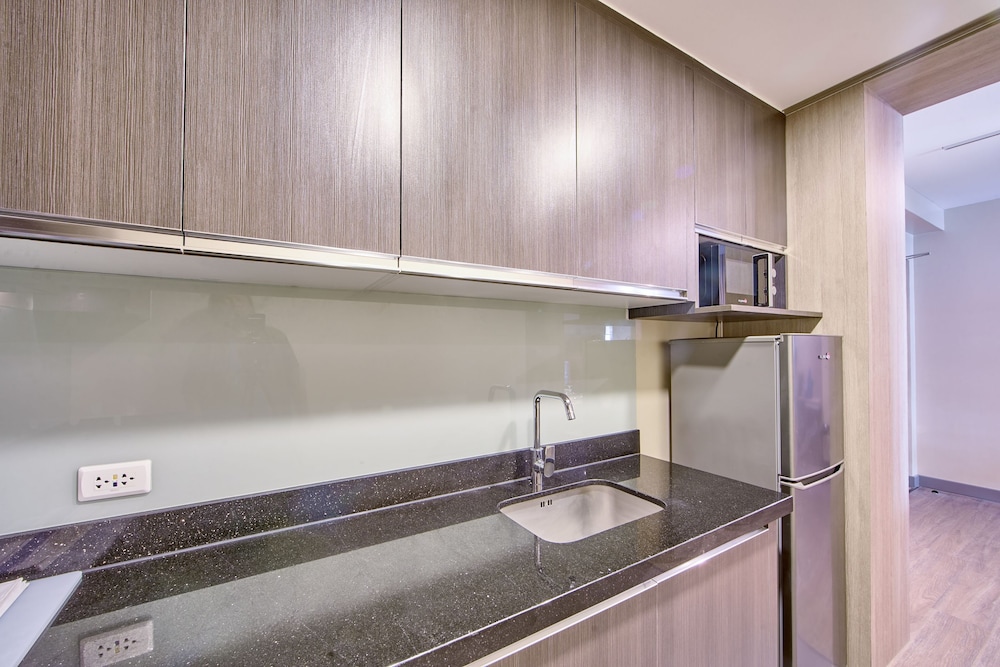 The Connor Serviced Residences Managed by HII 37/38