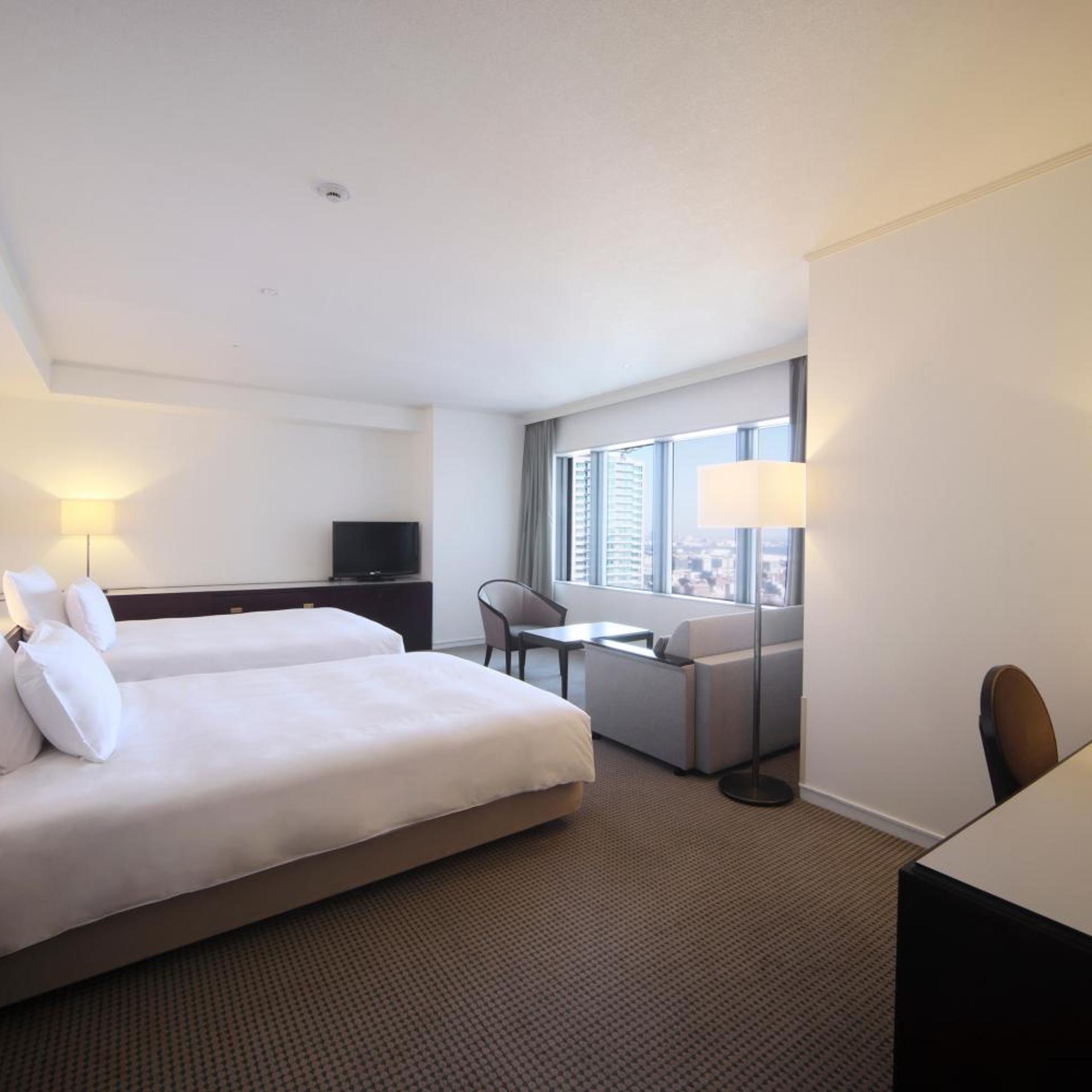 غرفة بريميوم بسرير مزدوج بإطلالة على المدينة مع أريكة