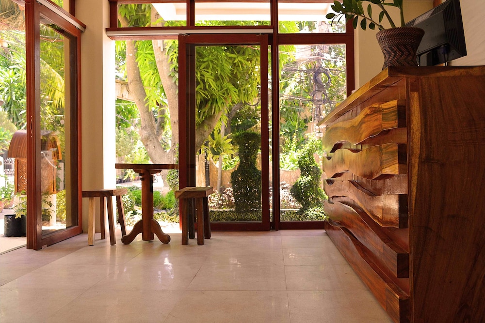 THE SITIO VILLAS AND SUITES 30/34