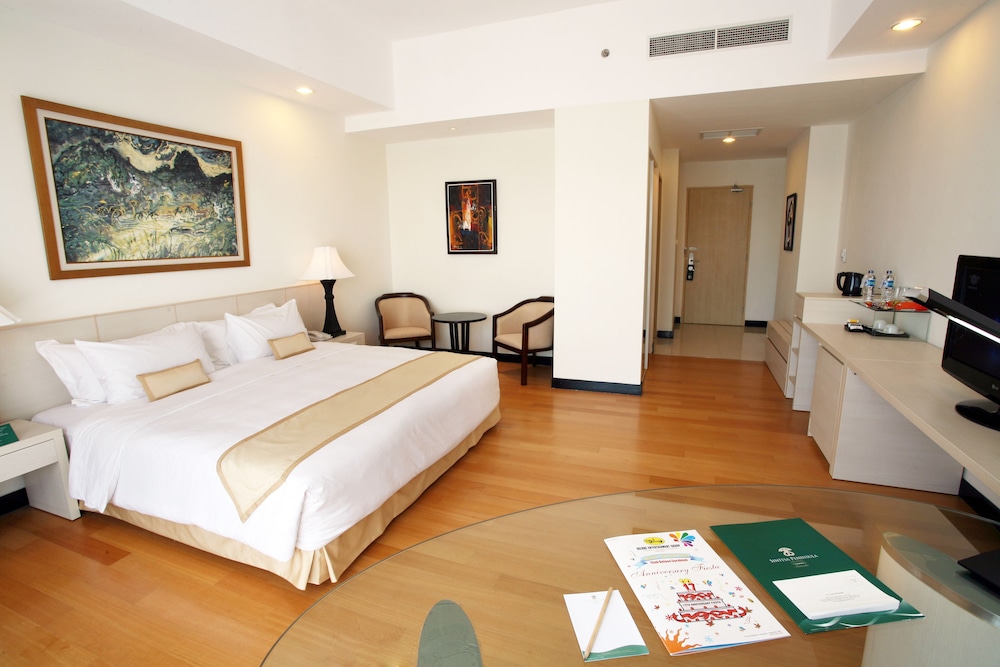 Sintesa Peninsula Hotel 12/40