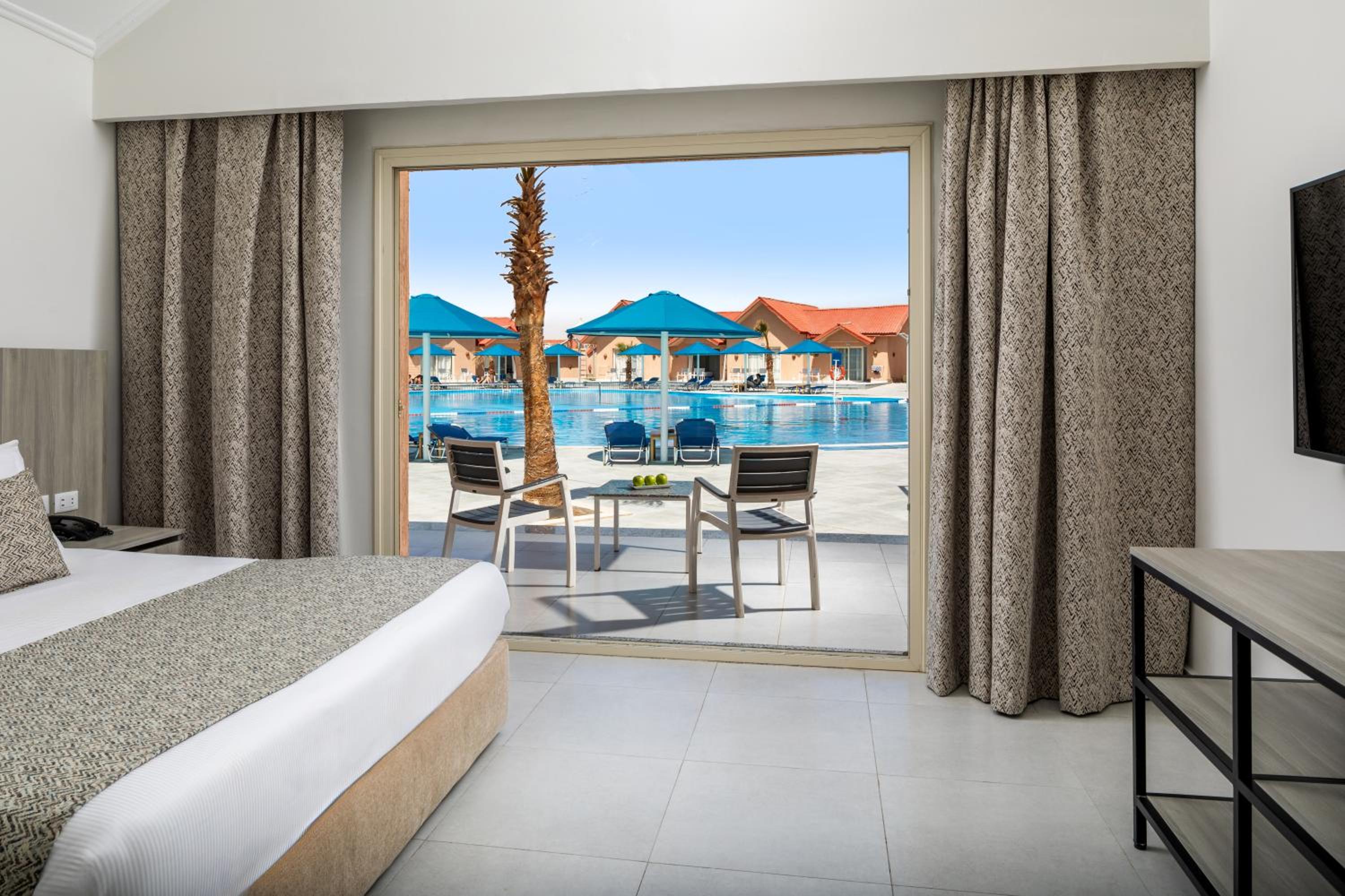Swim Up, Bungalow, King Bed, Pool View، Pickalbatros Jungle Aqua Park - Neverland Hurghada 2/2