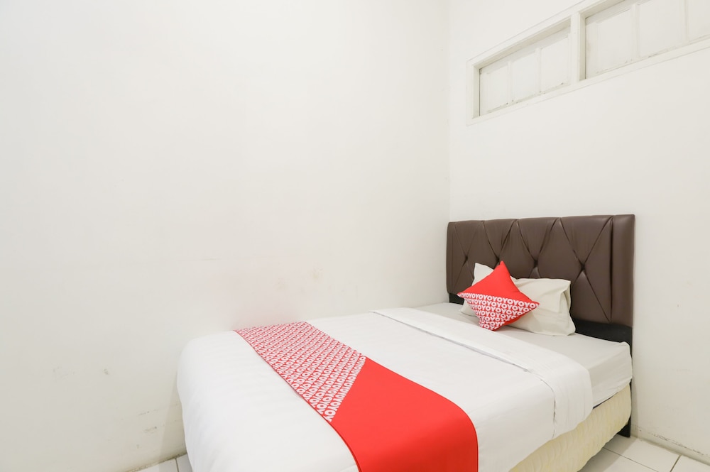 OYO 1111 Passer Baroe Inn 14/26