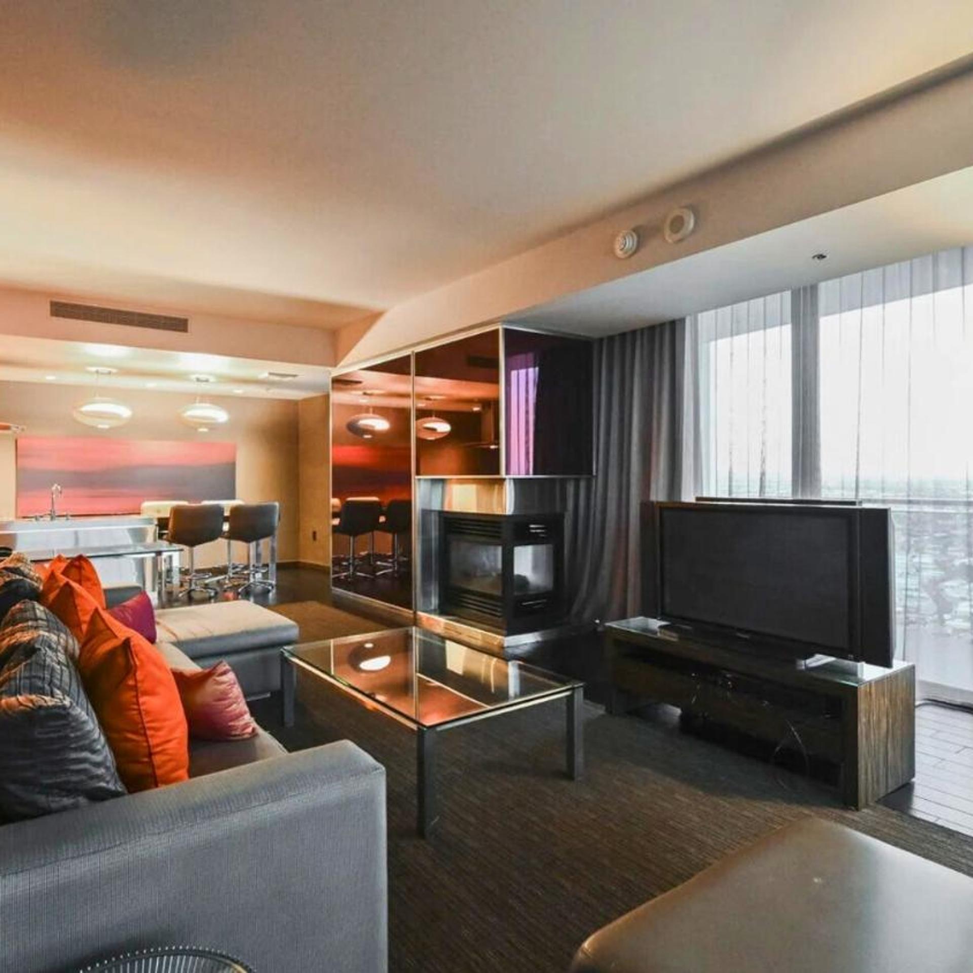 1 Bedroom Balcony Collection Living Room & Jet Tub Bath - StripSuite Palms Place Hotel 20/31