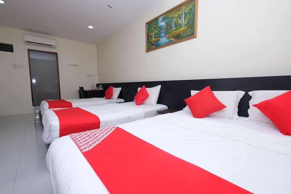 OYO 1104 Q Hotel 12/22