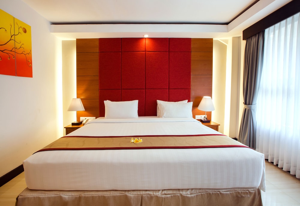 غرفة ديلوكس بسرير كوين بإطلالة على الحديقة