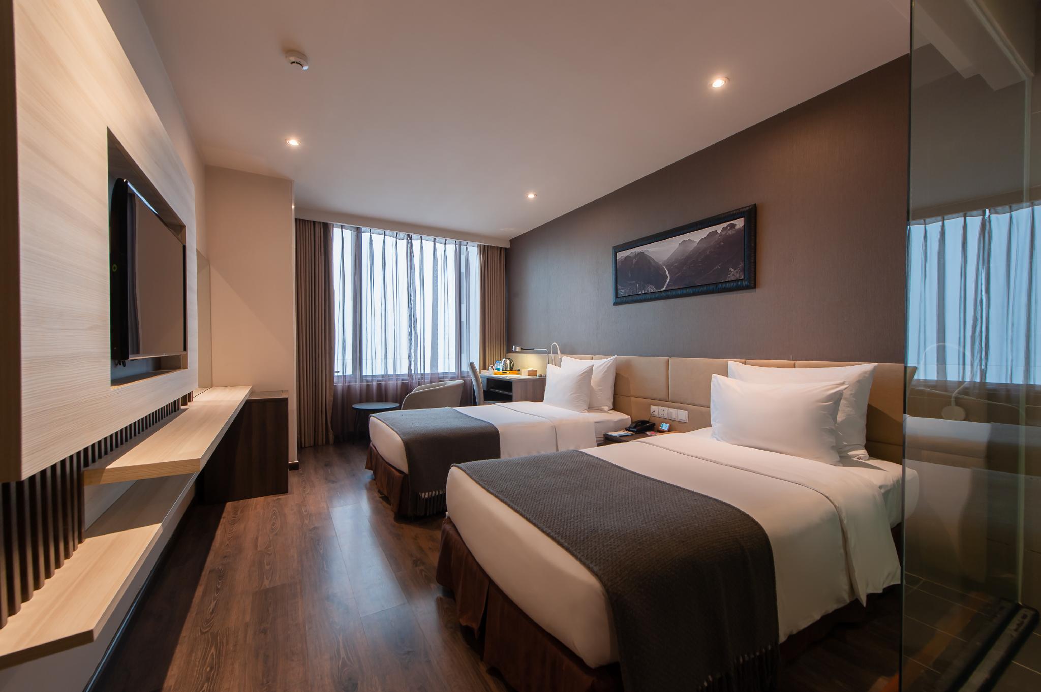 غرفة ديلوكس بسريرين منفصلين بإطلالة جزئية على البحر، Alana Nha Trang Beach Hotel 2/3