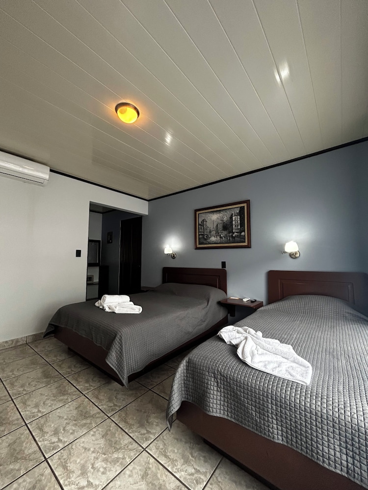 Standard, 1 Queen and 1 Single Bed, Garden Area