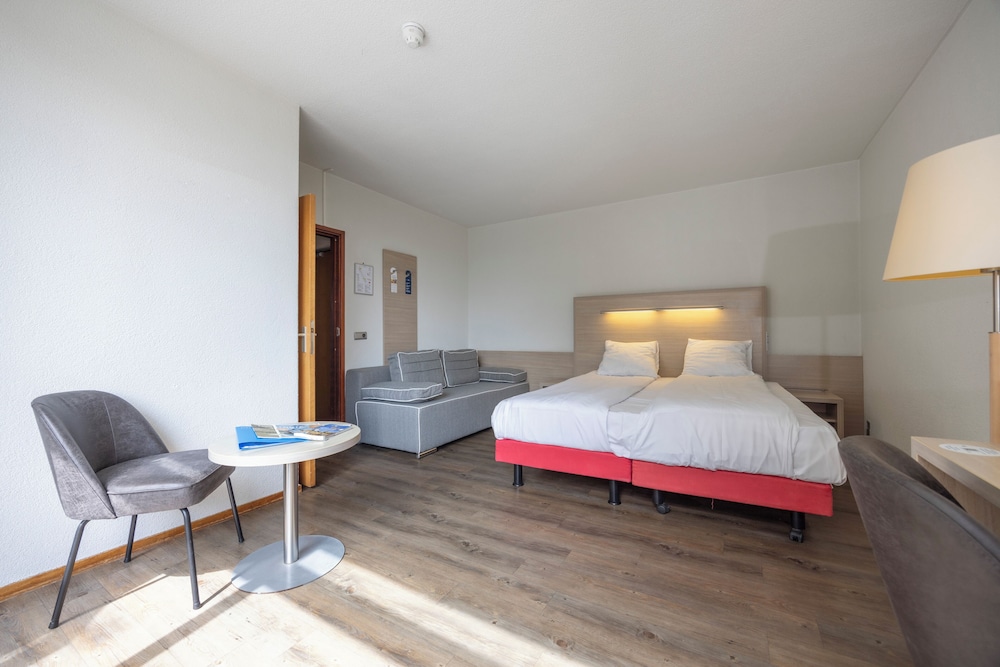 غرفة قياسية بسريرين منفصلين بشرفة، Fletcher Hotel-Restaurant De Witte Raaf 3/7