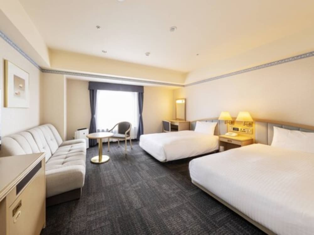 DELUXE, TWIN BEDS, SMOKING