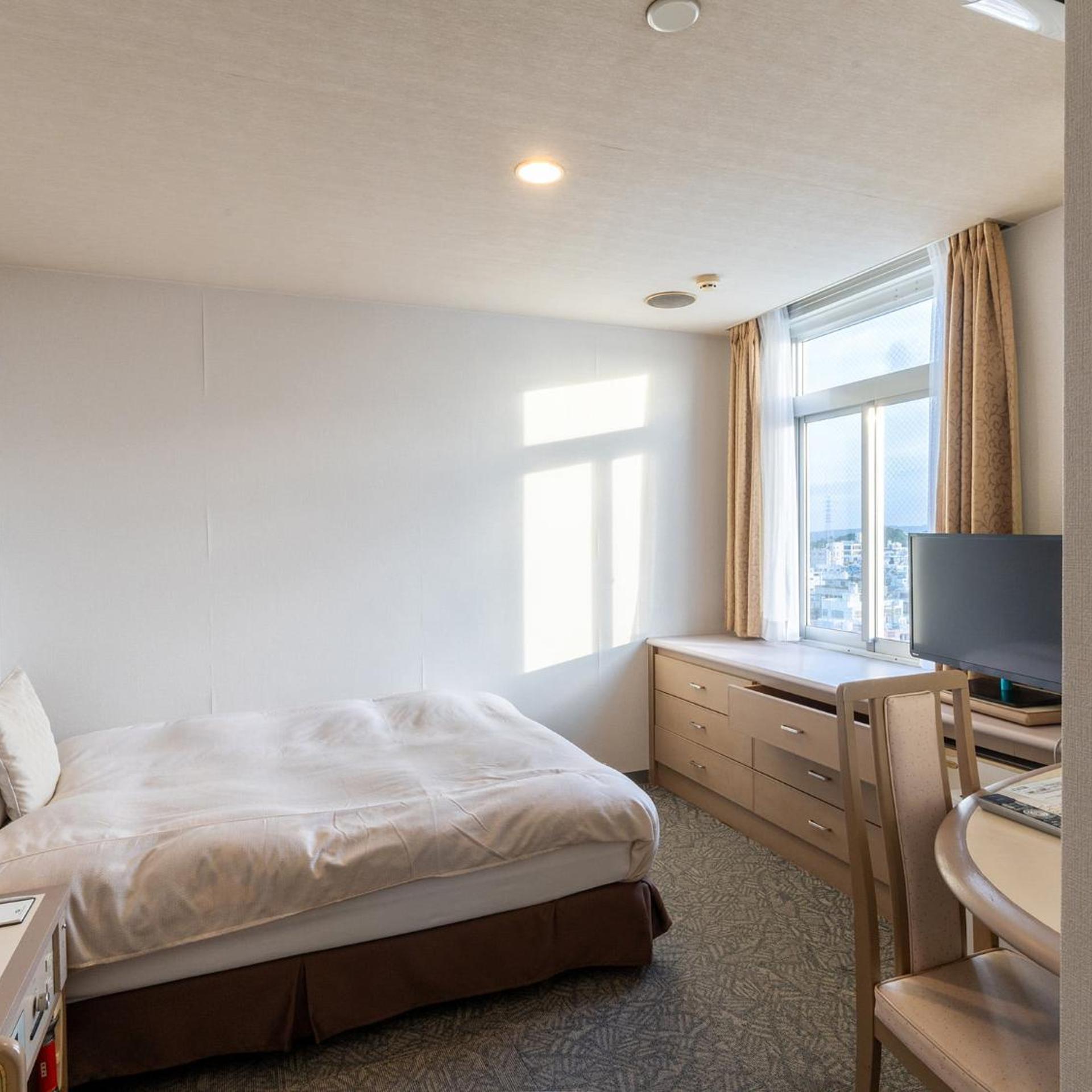 غرفة مفردة، Hotel New Century 5/13