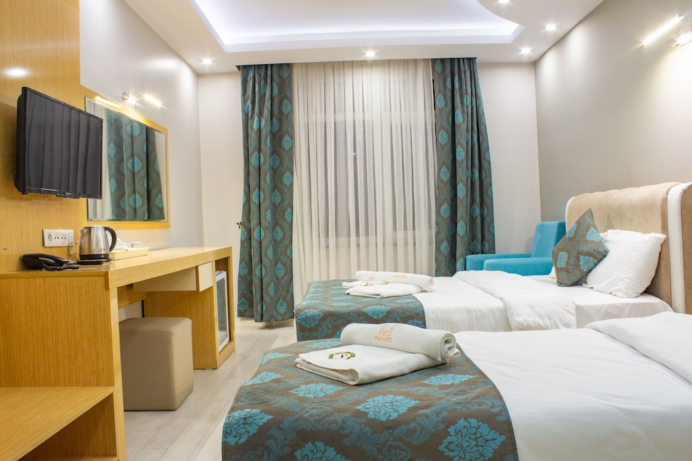 DELUXE, TWIN BEDS