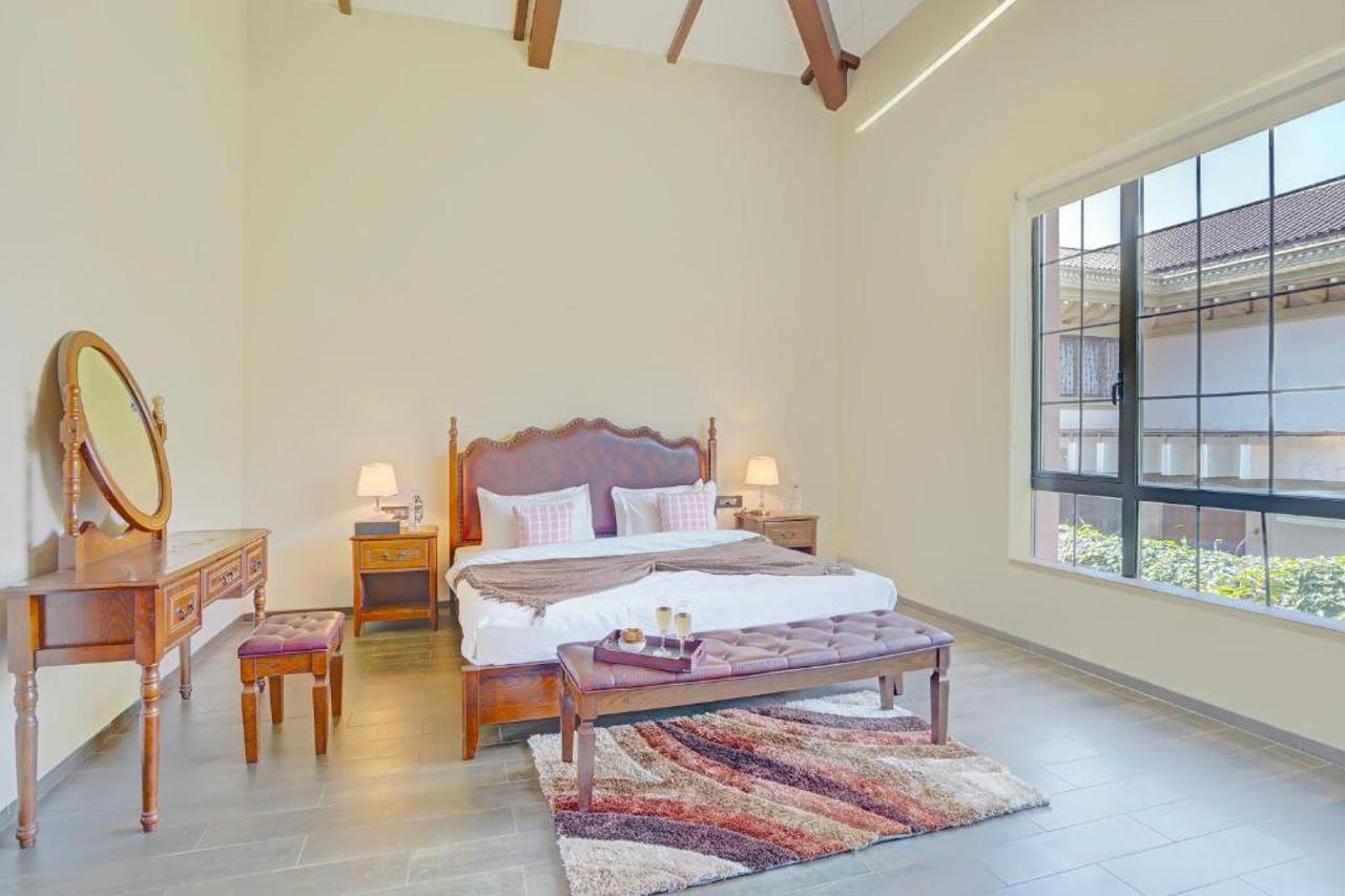 ELIVAAS Villa 39 Serene 6 BHK Retreat with Pvt Pool, Gaming Zone & Balcony 6/23