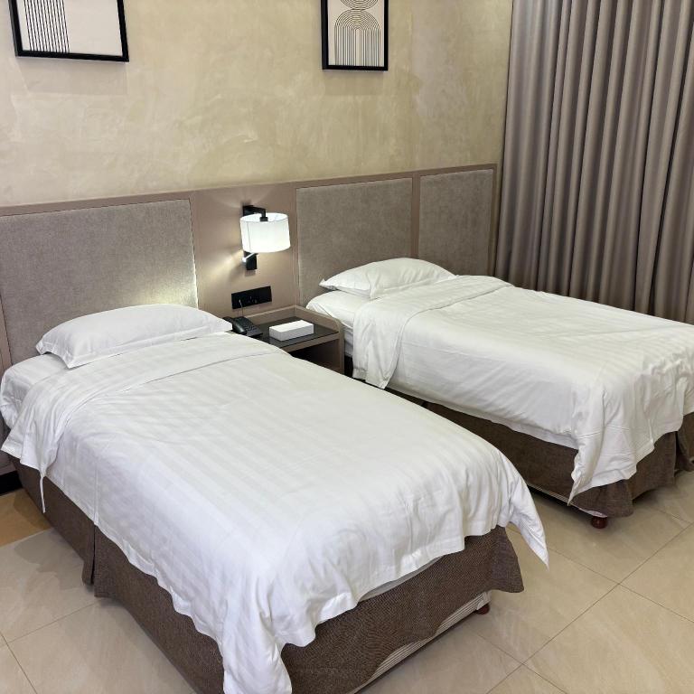 Deluxe, Twin Beds