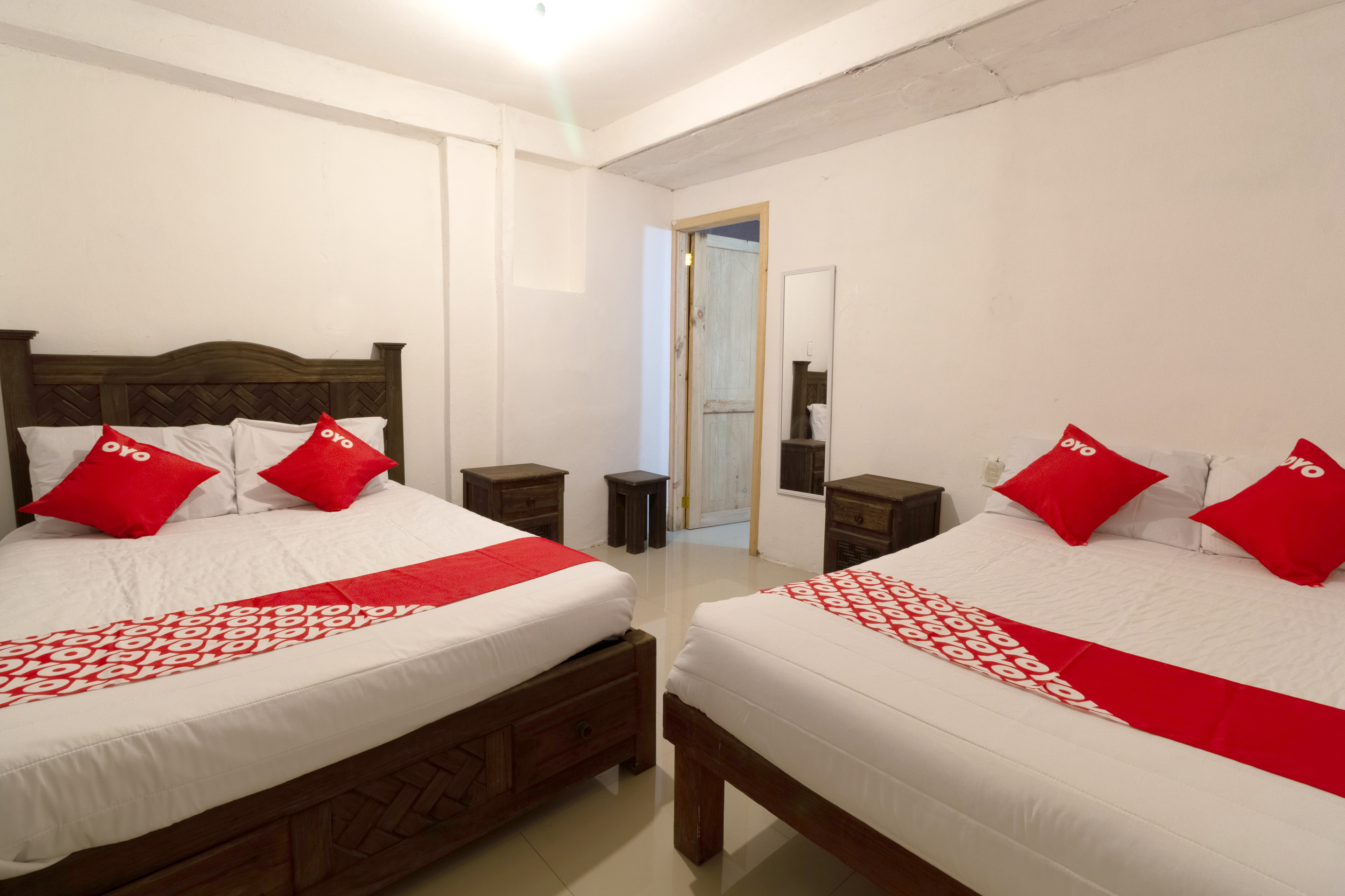 غرفة بسريرين، OYO Hotel Punta Guadalupe, San Cristobal de las Casas 4/6
