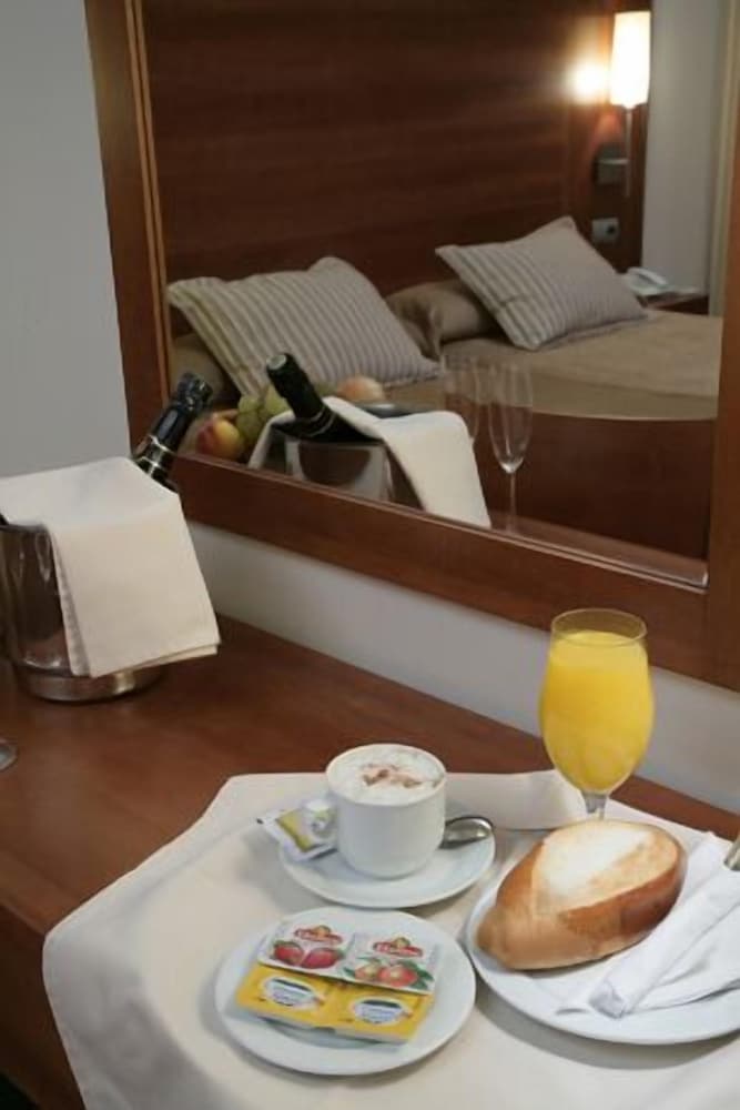 Hotel Bs Capitulaciones 19/28