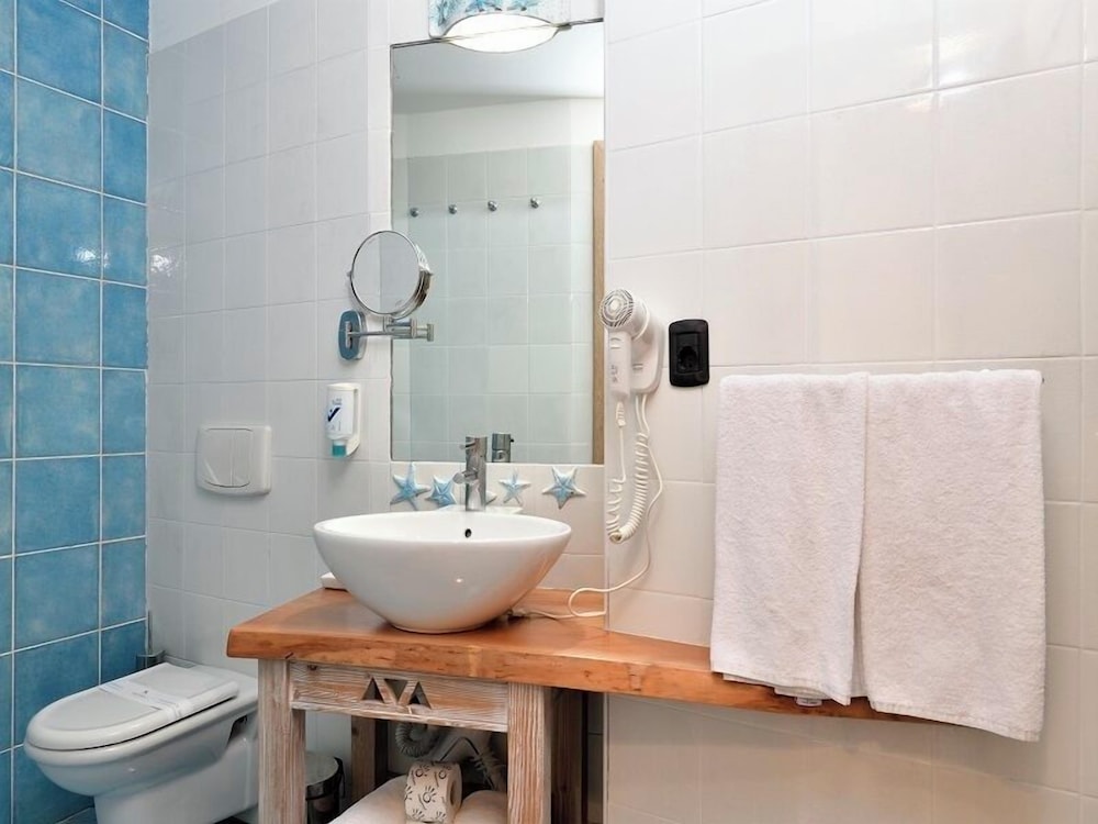 Hotel Resort And Spa Baia Caddinas 49/50