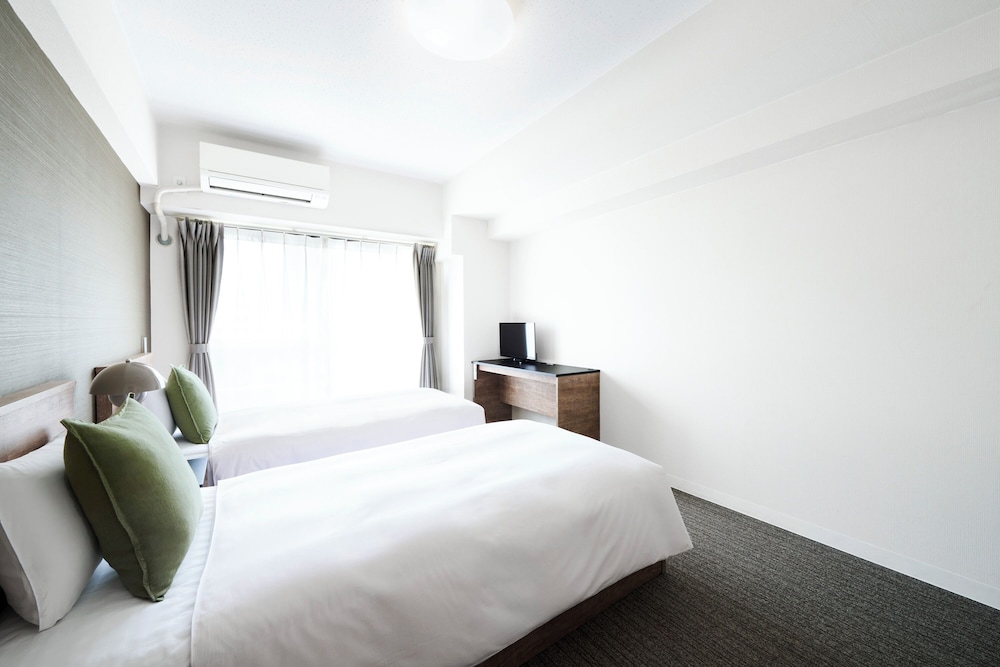 غرفة بسريرين منفصلين، Montan Hakata Hostel 2/3