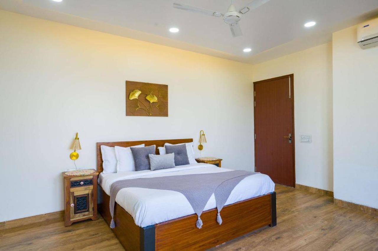 ELIVAAS AdhiVa Retreat 5 BHK Farmhouse with Pvt Pool, Bar & Lush Garden 6/15