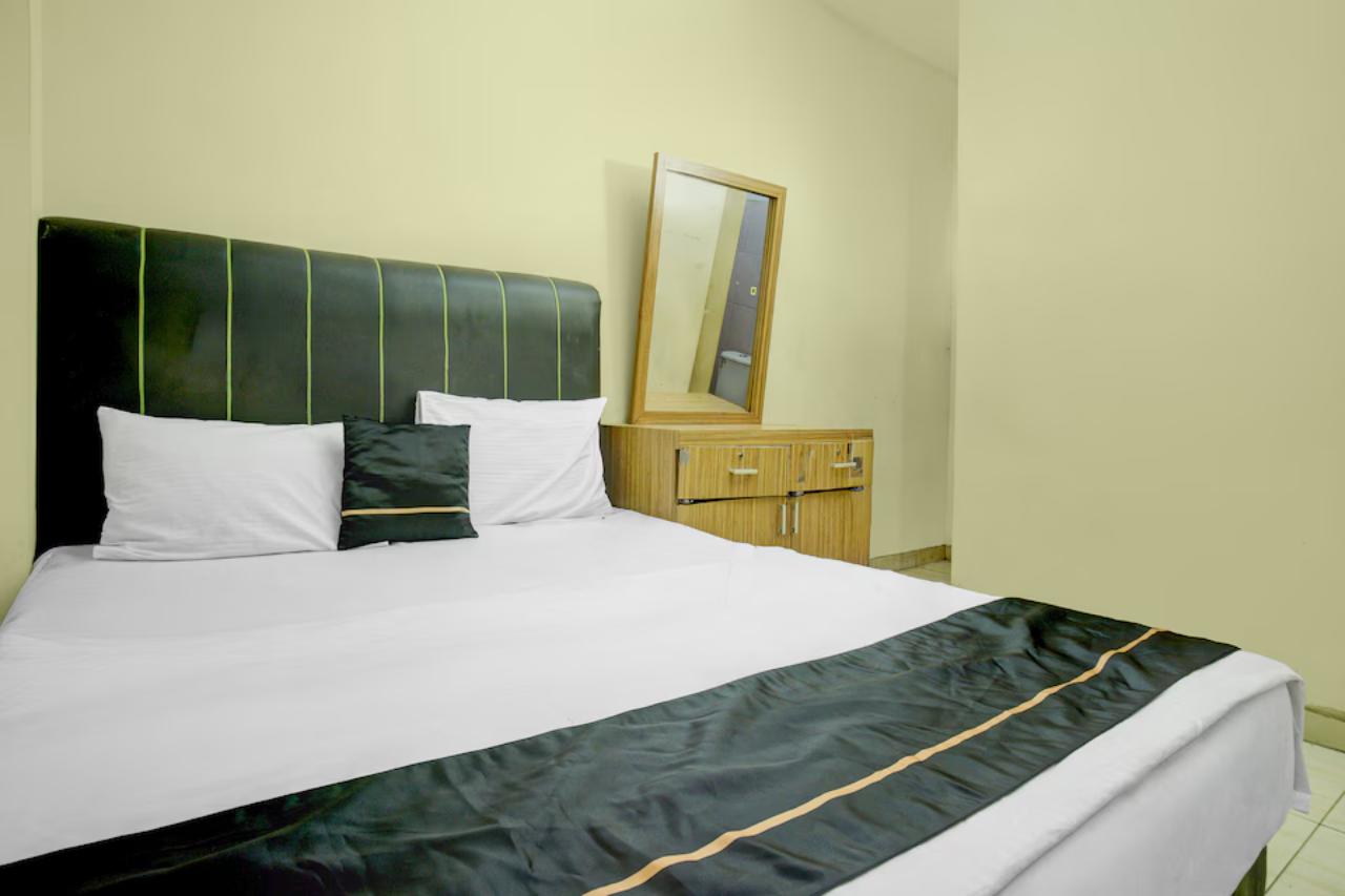 Room at Hotel O near Stadion Pahoman formerly Rama Shinta Guest House, BANDAR LAMPUNG
