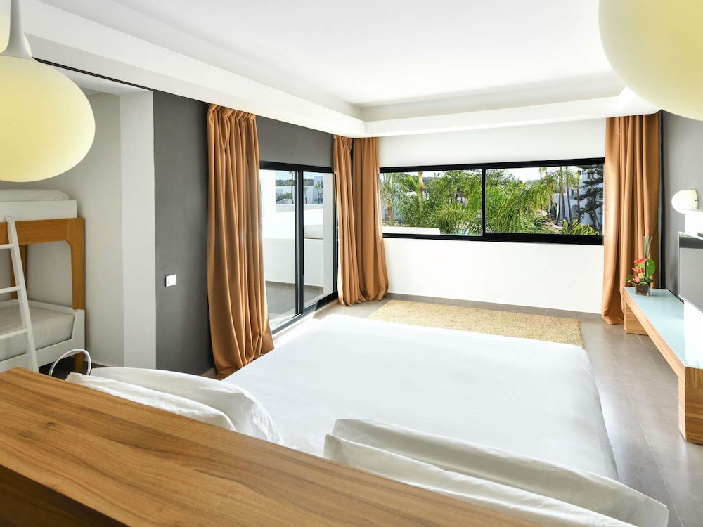 غرفة عائلية بسرير كينج وأسرّة بطابقين، Hotel Royal Golf and Spa Mazagan 4/8