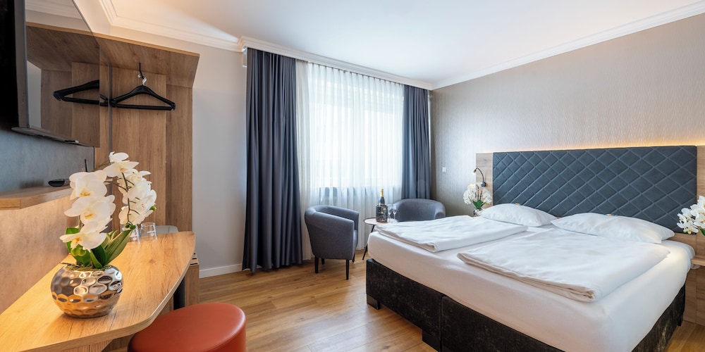 غرفة كومفورت بسرير مزدوج، PLAZA INN Rieker Stuttgart Hauptbahnhof 5/7