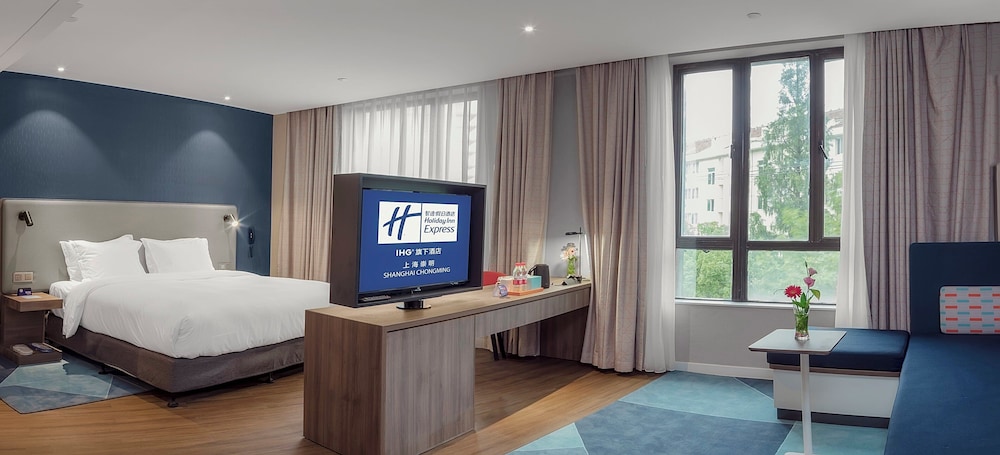 جناح بسرير كينج بمنطقة جلوس في الطابق العلوي، Holiday Inn Express Shanghai Chongming 5/9
