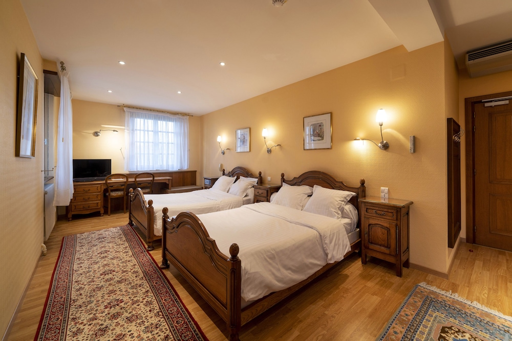 غرفة كومفورت ثلاثية بثلاثة أسرّة، Hotel Munsch 3/8