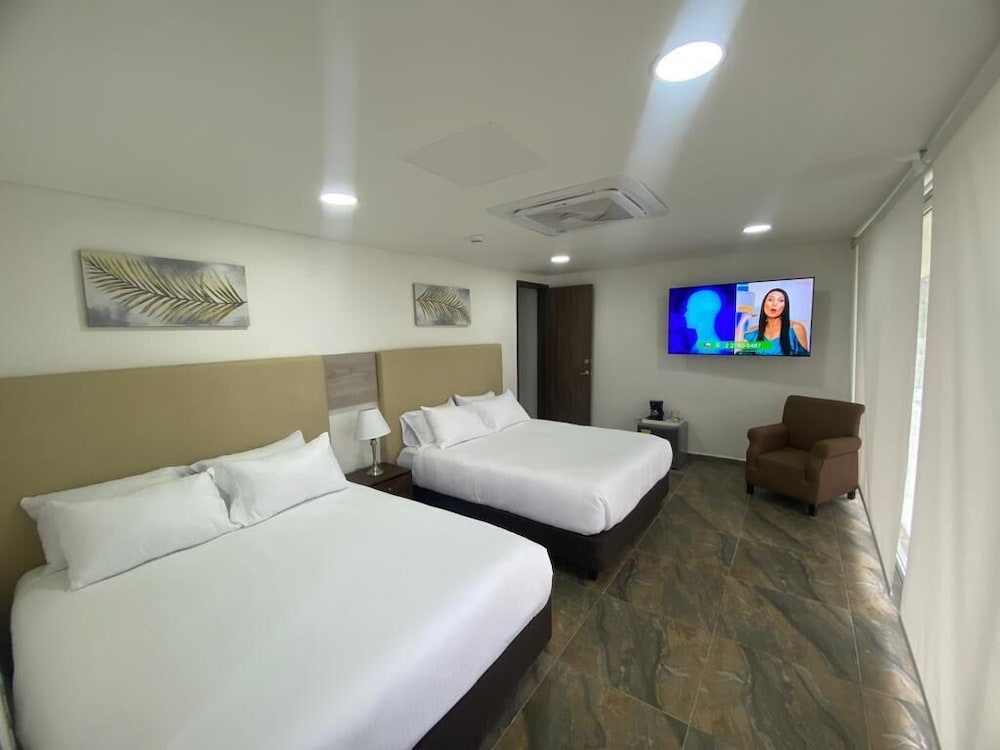 DELUXE, DOUBLE OR TWIN BED