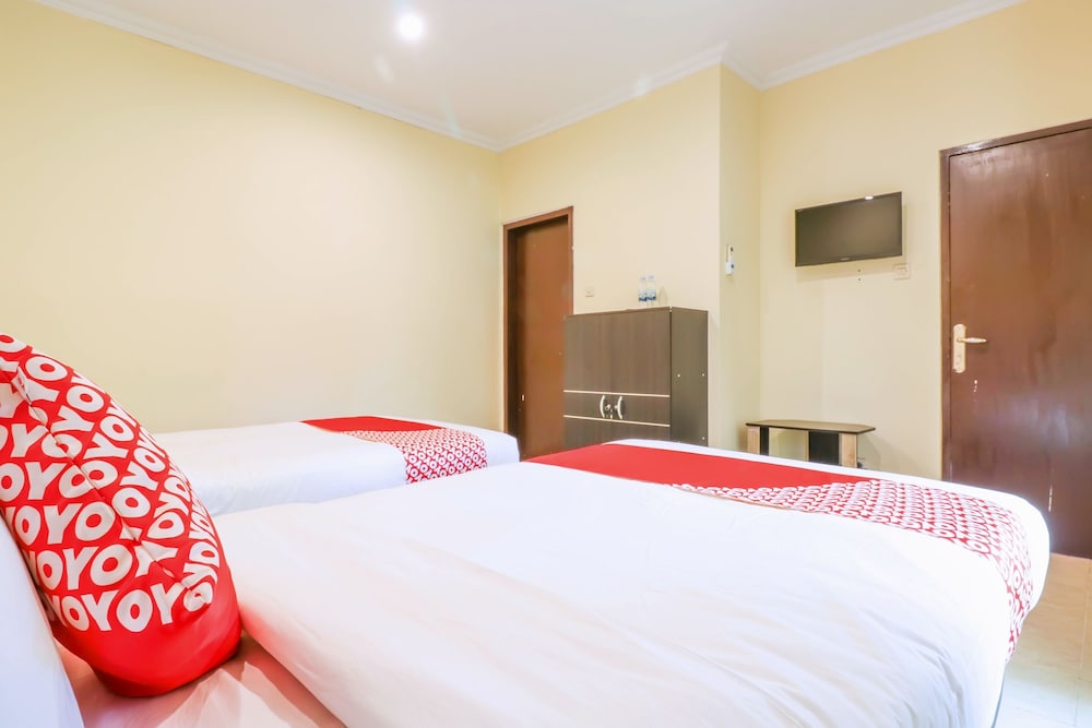 Super OYO 1654 Maha Bharata Kuta Inn 15/31