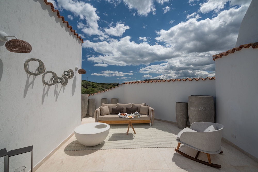 Sulia House Porto Rotondo, Curio Collection by Hilton 7/99