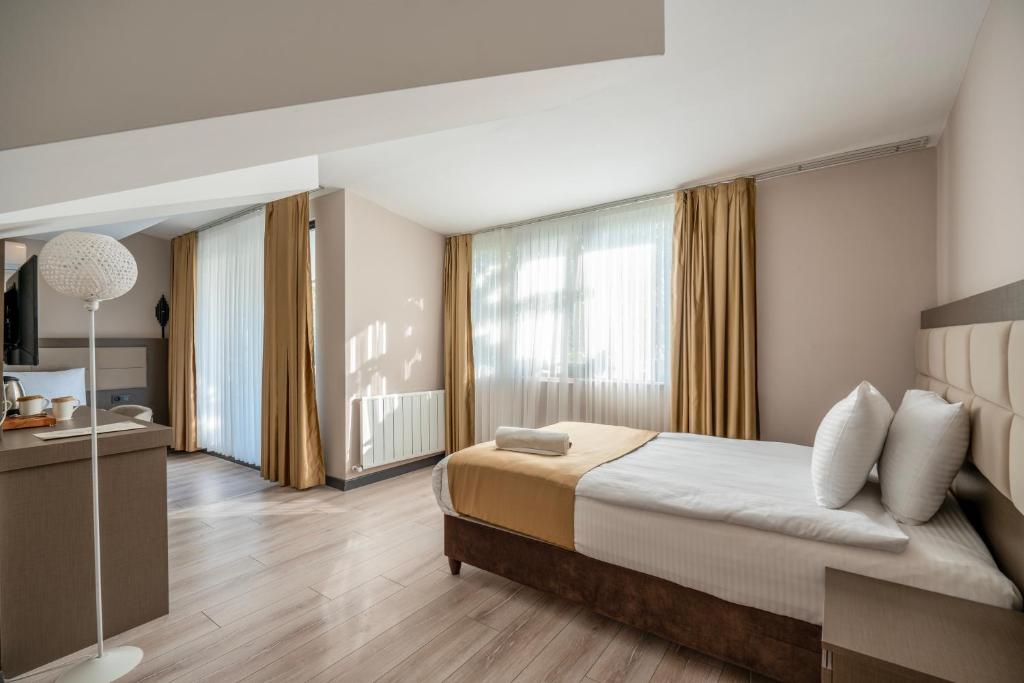 غرفة عائلية بشرفة، Magia Hotel 2/4