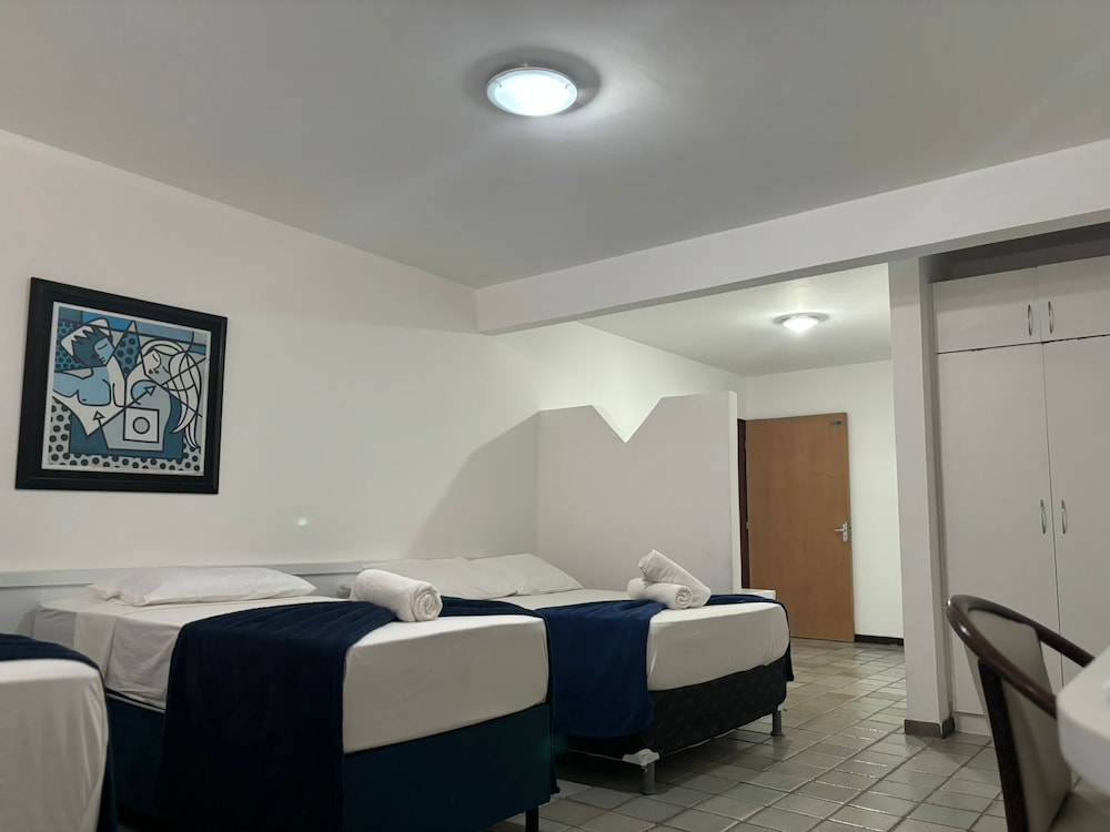 غرفة قياسية رباعية بسرير مزدوج وسريرين منفصلين، Praia Hotel Enseada 8/9