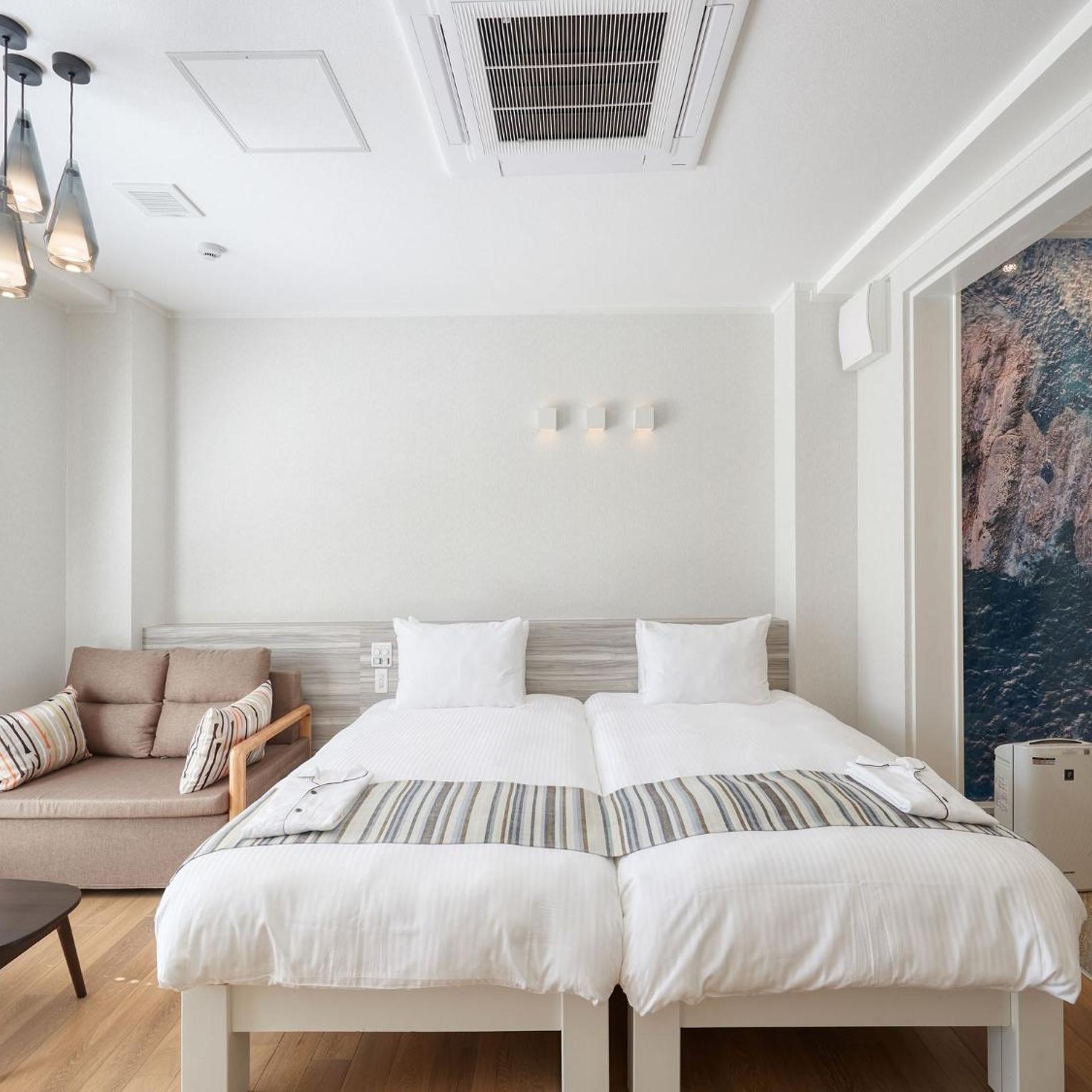 غرفة بسريرين منفصلين، La Casa Panacea Okinawa Resort 5/10