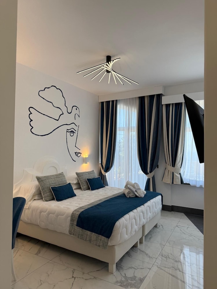 غرفة جونيور بسرير مزدوج وسريرين منفصلين، Positano Art Hotel Pasitea 3/10