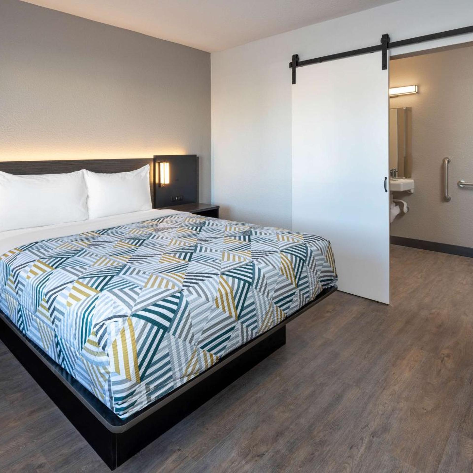 1 Queen Bed - ADA/RI Shower/Mini Fridge